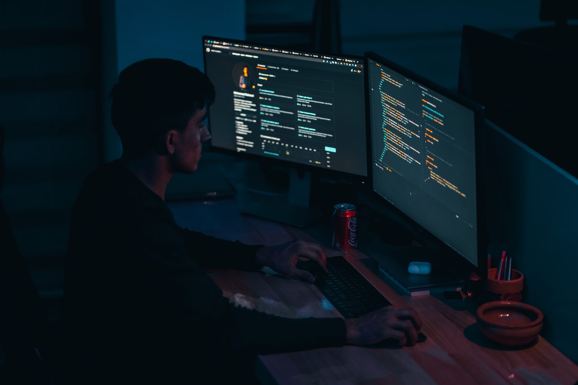 Image of developer with two monitors